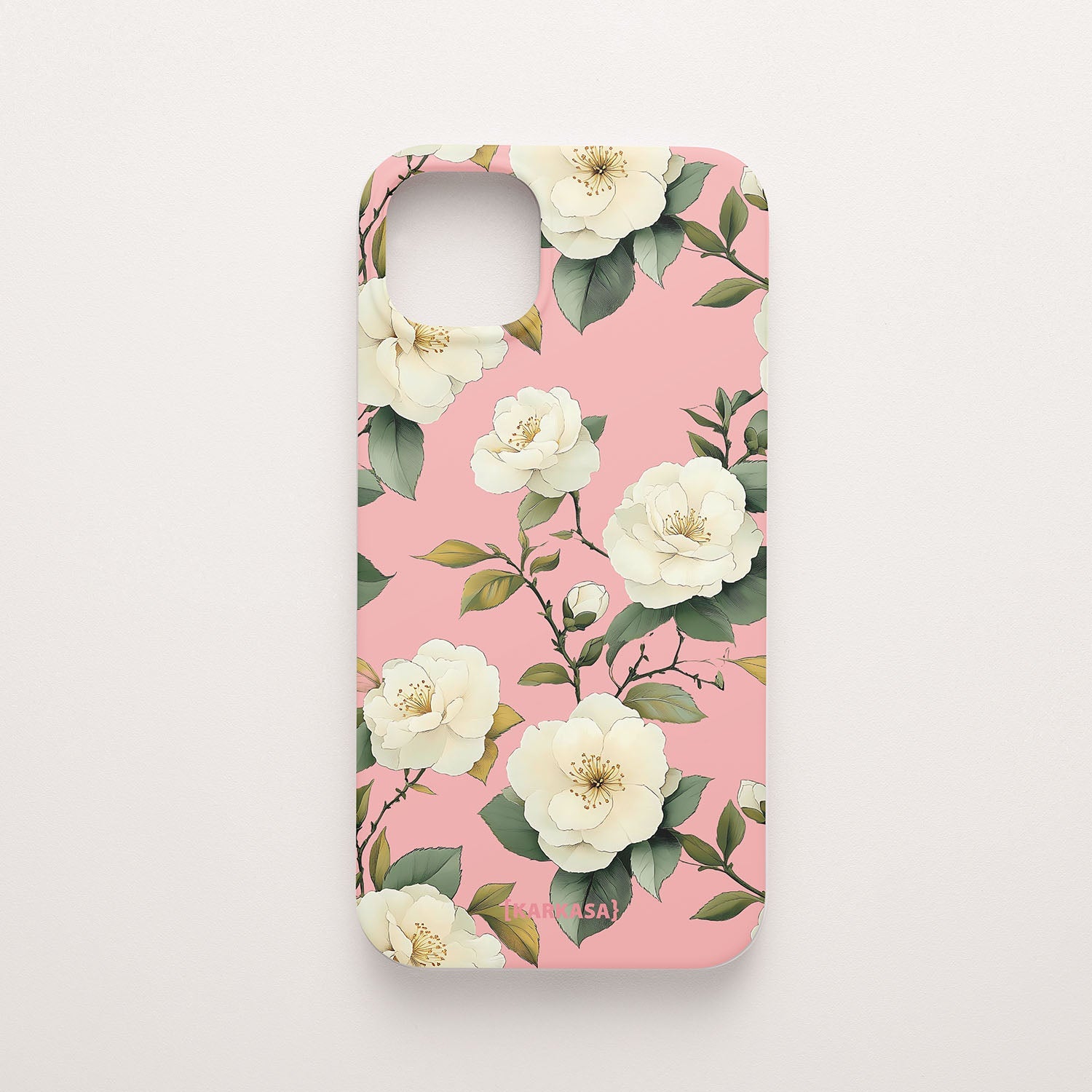 Funda móvil Camelias Serenas KARKASA en Silk Touch rosa chicle con diseño floral de camelias blancas.