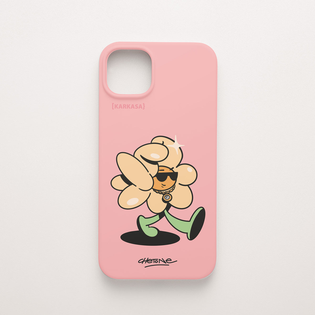 Funda de móvil de silicona rosa chicle con una flor color melocotón con gafas de sol y cadena dorada, diseño Chill Grind de Chetone Sánchez para KARKASA.
