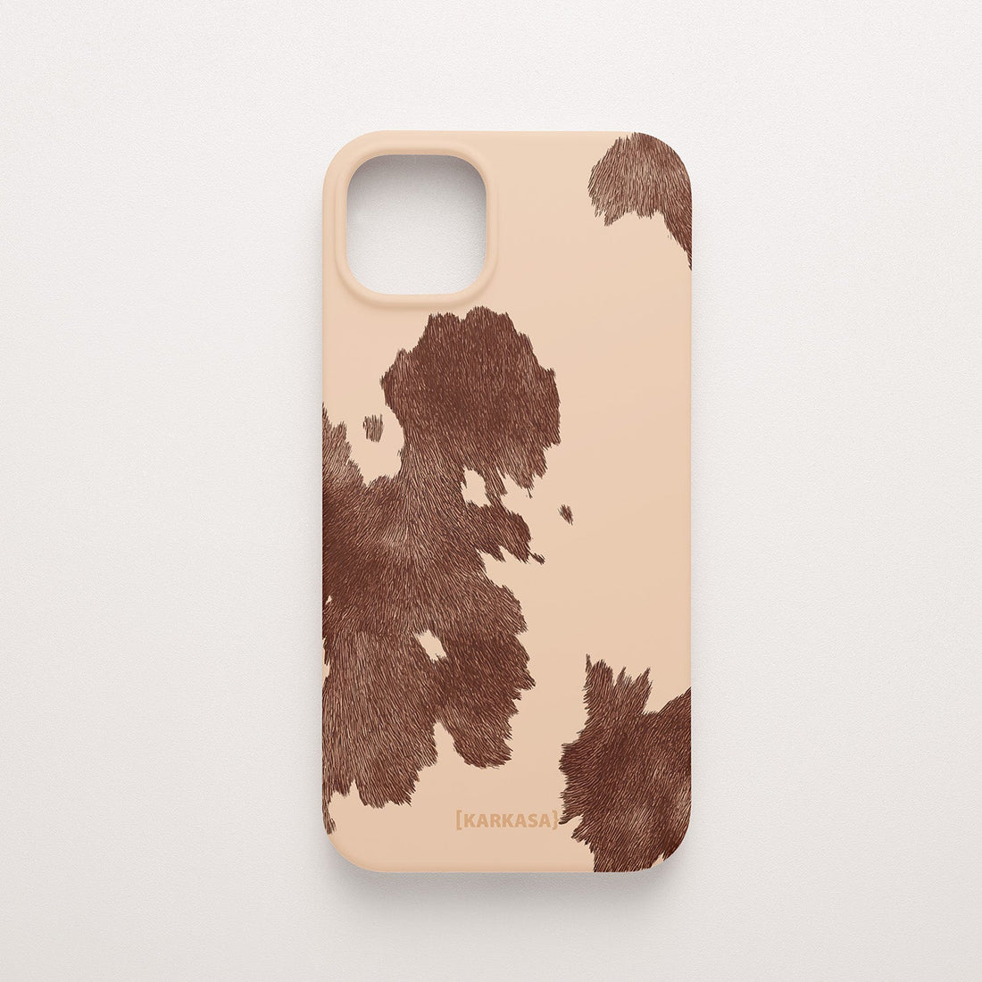 Funda KARKASA Silk Touch rosa nude con estampado de manchas de vaca en color marrón chocolate. Carcasa diseño animal print western.