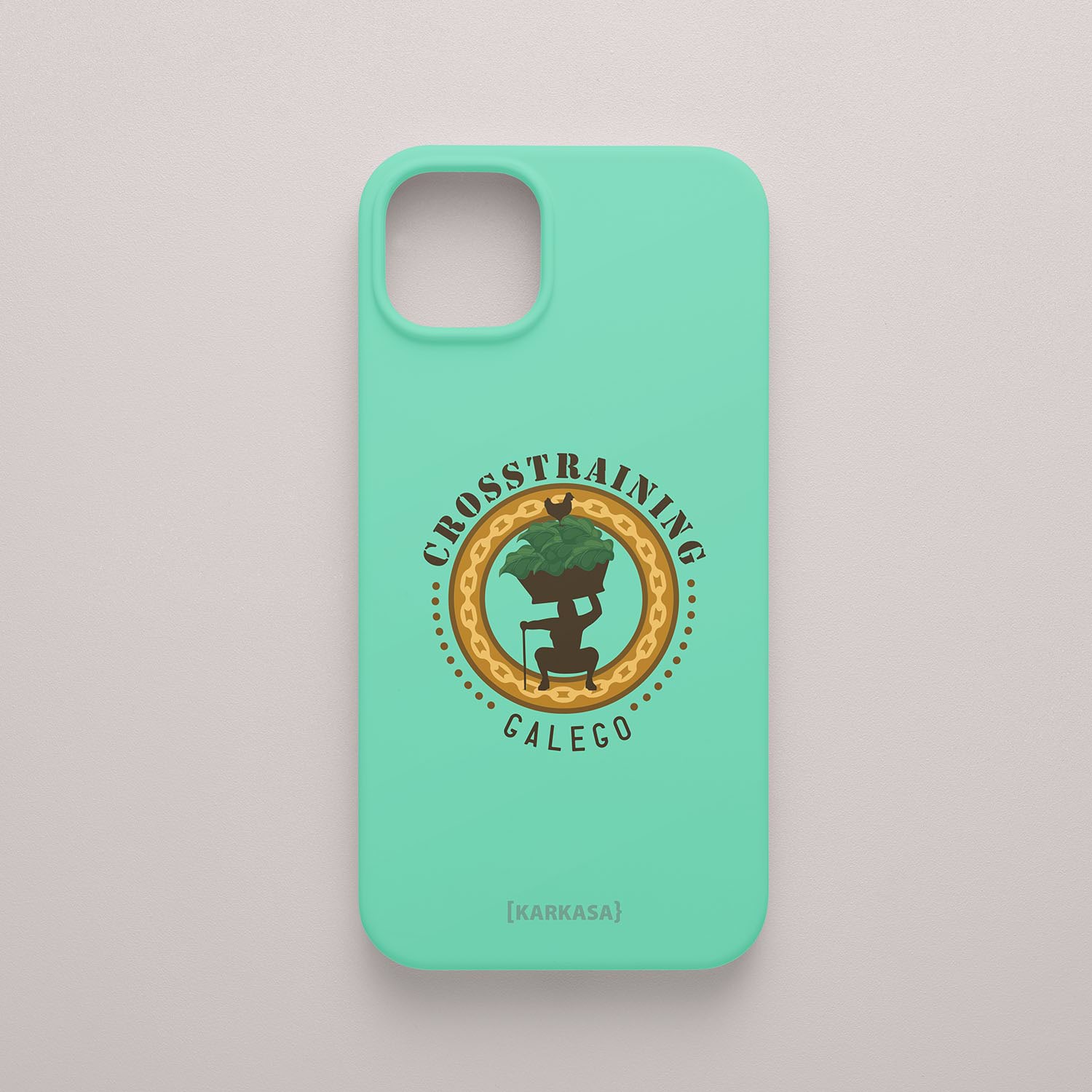 Funda verde menta con ilustración de una pesa rusa llena de grelos y el texto "Crosstraining Galego", diseño de humor deportivo de Son un Toxo.