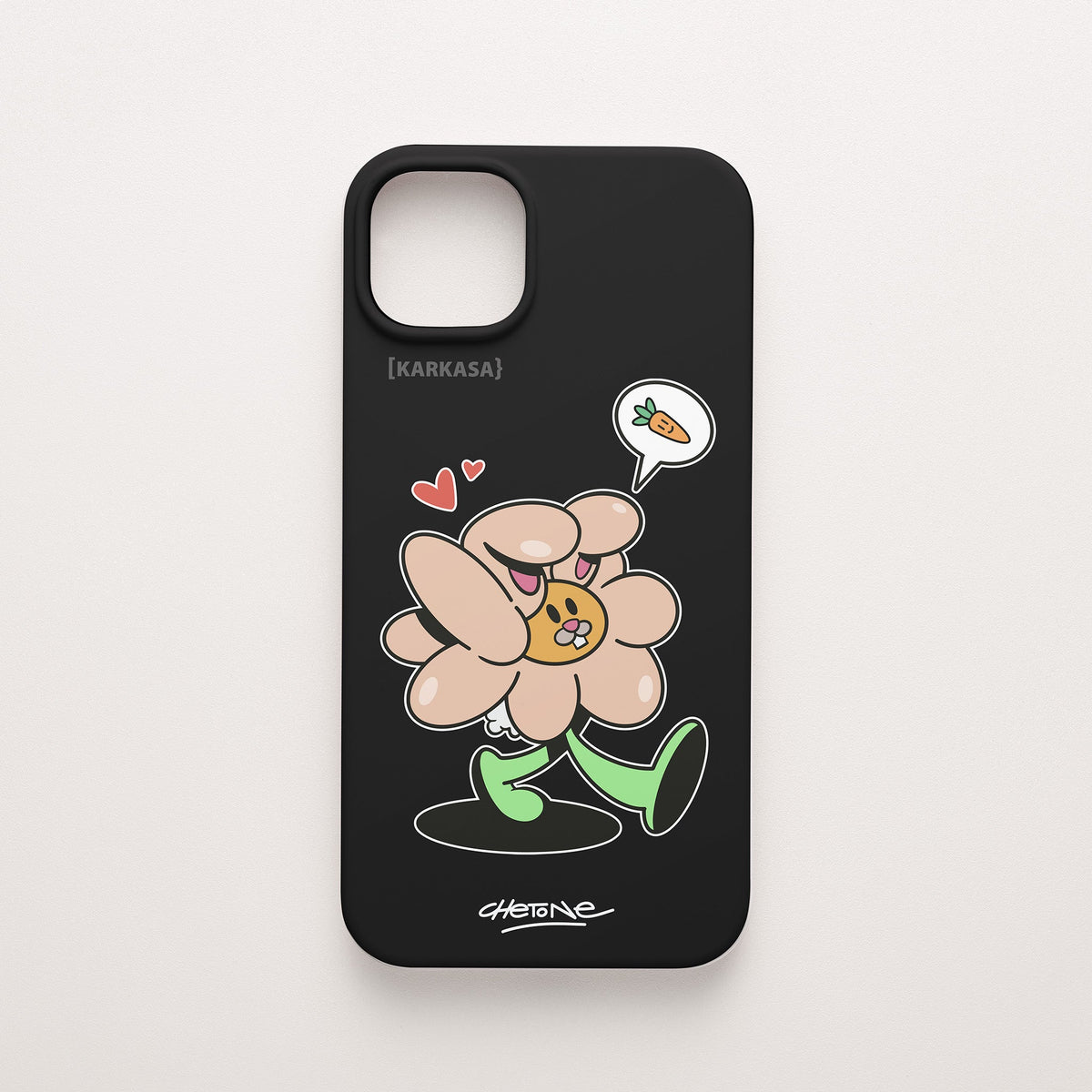 Funda de móvil de silicona negra con una flor rosa con orejas de conejo y corazones perfilada en blanco, diseño Good Bunny de Chetone Sánchez para KARKASA.
