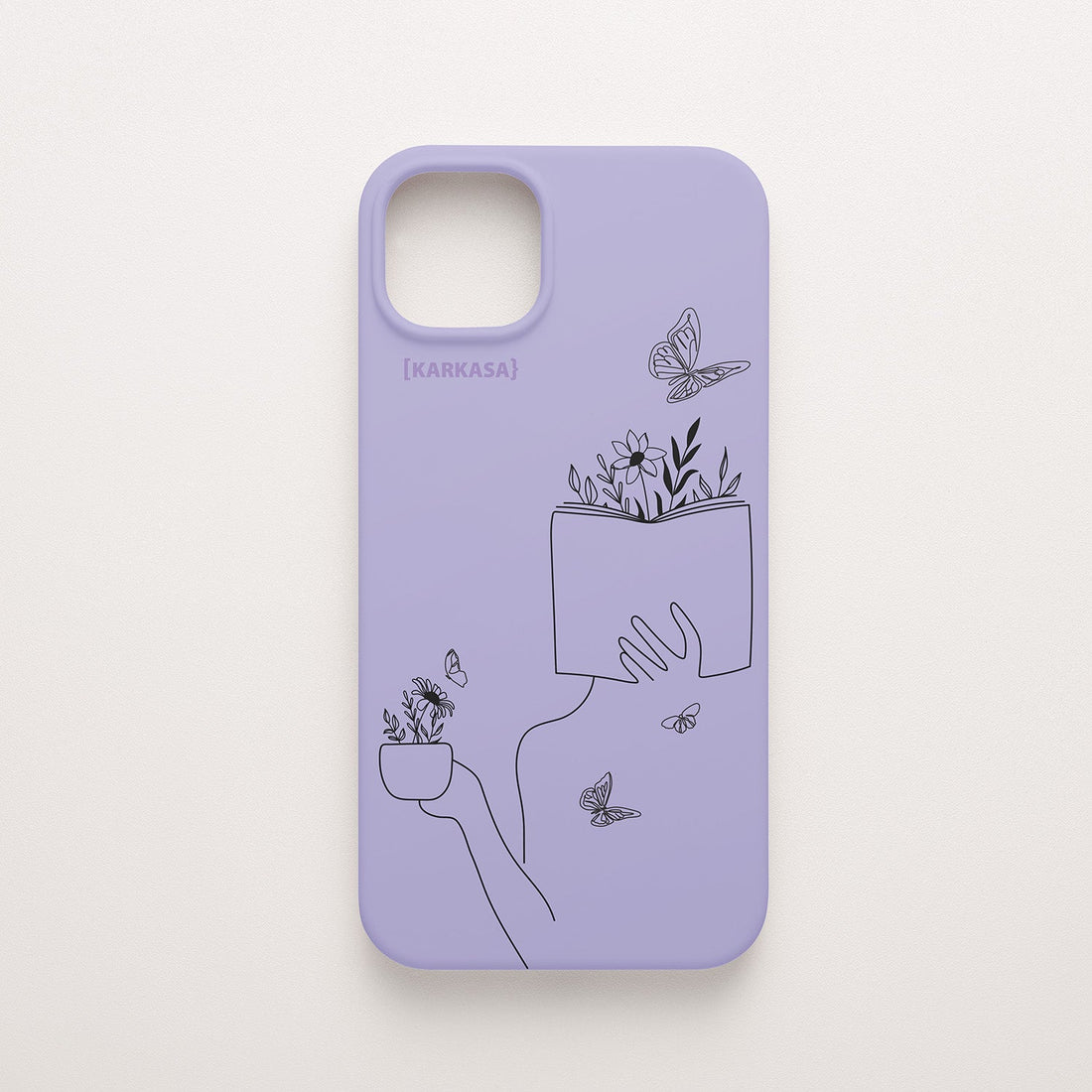 Funda de móvil KARKASA con ilustración lineal negra de una figura leyendo con flores y mariposas, en silicona mate Silk Touch lila.