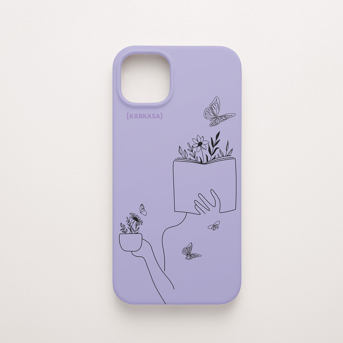 Funda de móvil KARKASA con ilustración lineal negra de una figura leyendo con flores y mariposas, en silicona mate Silk Touch lila.
