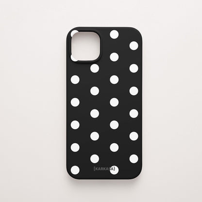 Funda KARKASA Silk Touch negra con estampado clásico de lunares blancos (polka dots). Carcasa mate de silicona estilo retro vintage.