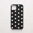 Funda KARKASA Silk Touch negra con estampado clásico de lunares blancos (polka dots). Carcasa mate de silicona estilo retro vintage.