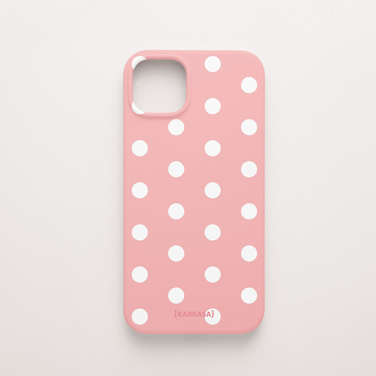 Funda KARKASA Silk Touch rosa chicle con estampado clásico de lunares blancos (polka dots). Carcasa mate de silicona estilo retro vintage.