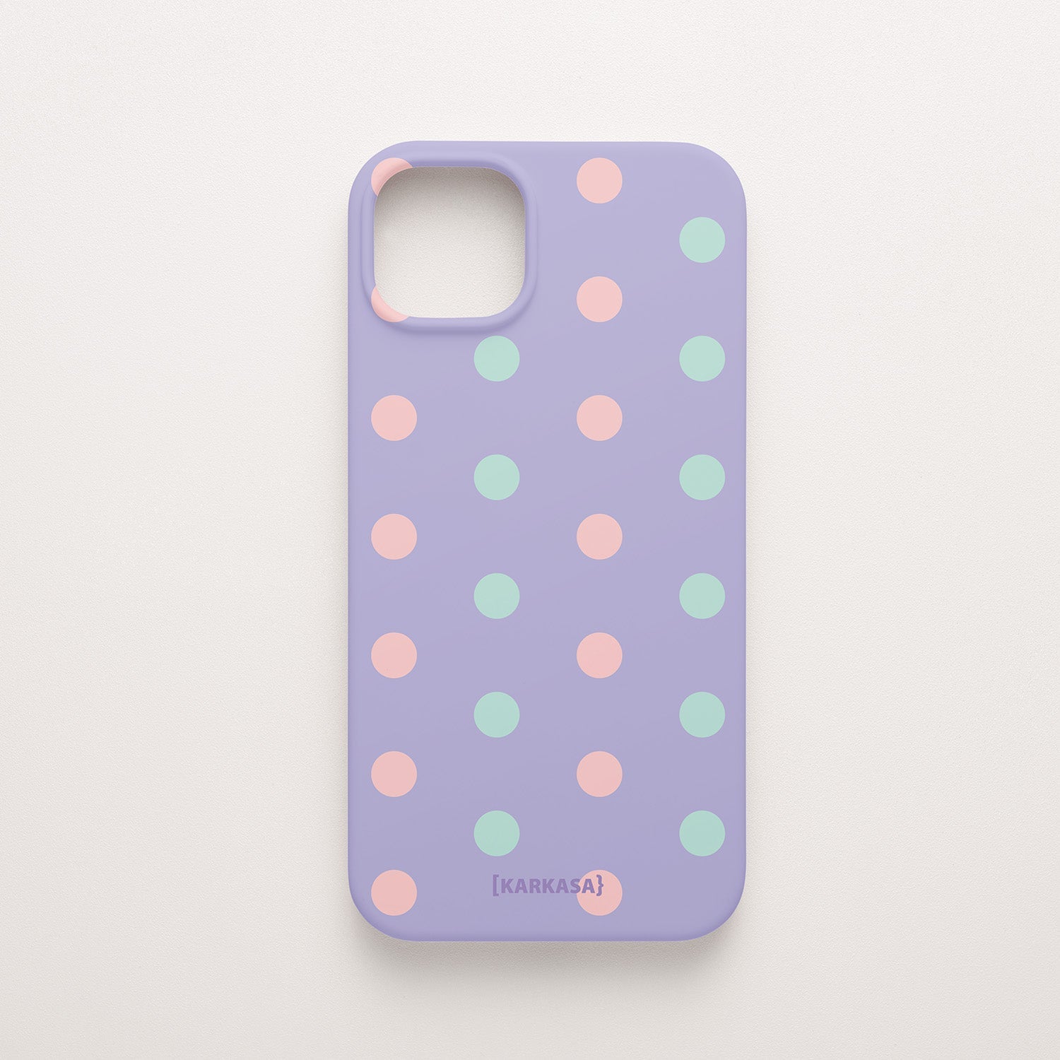 Funda KARKASA Silk Touch lila con estampado de lunares en colores rosa pastel y verde menta. Carcasa diseño pop divertido.