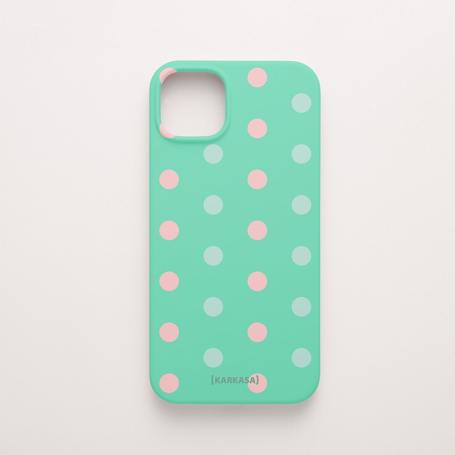 Funda KARKASA Silk Touch verde menta con estampado de lunares en colores rosa pastel y verde menta. Carcasa diseño pop divertido.