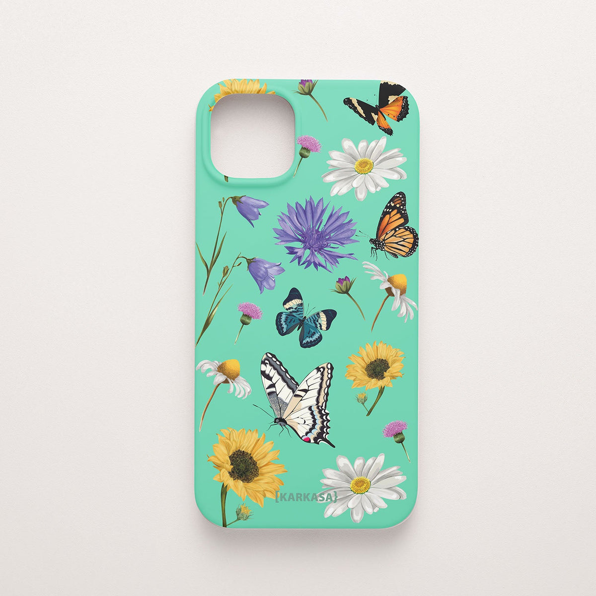 Funda móvil Pradera de Mariposas KARKASA en Silk Touch verde menta con mariposas, margaritas y flores silvestres.