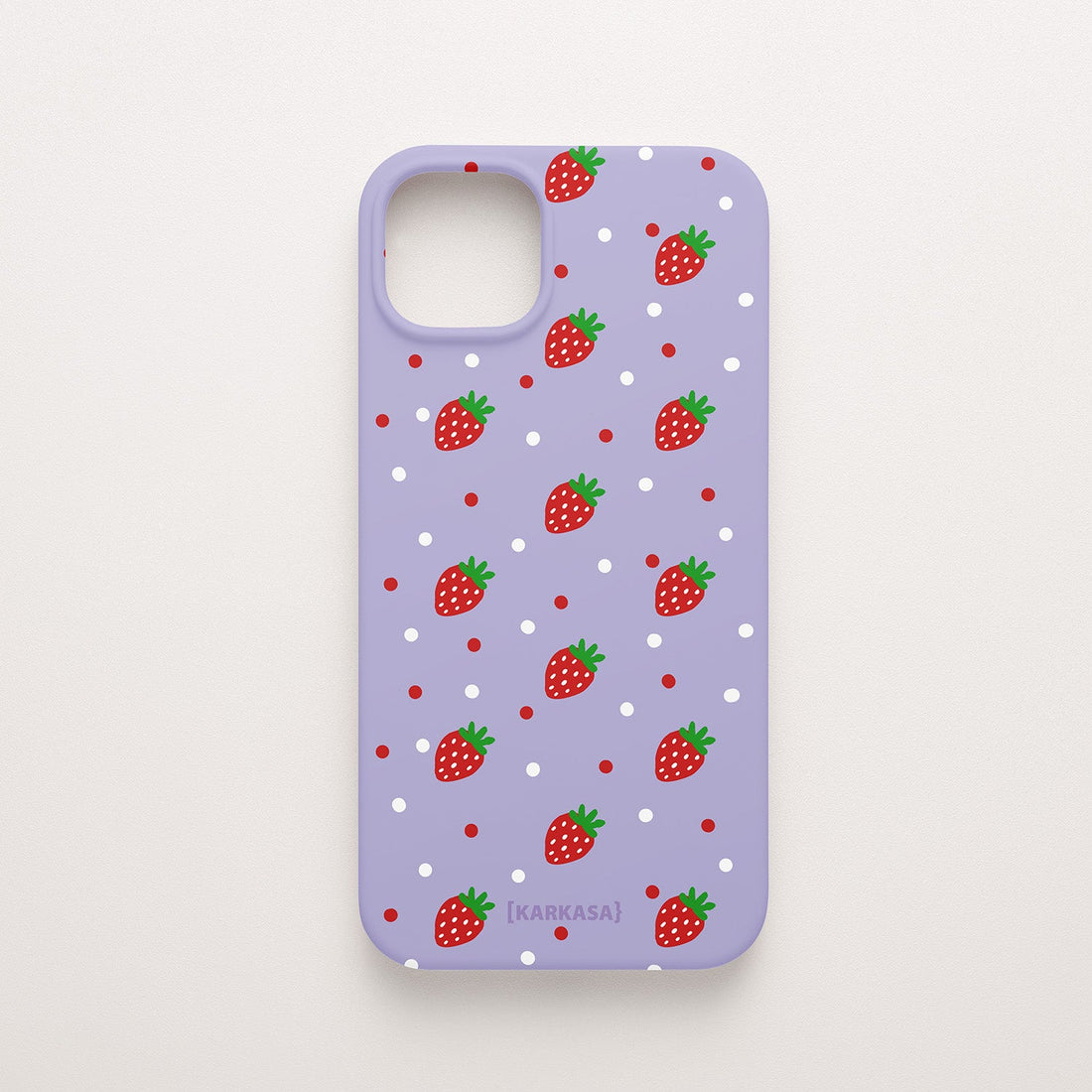Funda KARKASA Silk Touch lila con estampado pop de fresas rojas y lunares blancos. Carcasa mate de silicona estilo frutal.