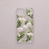 Funda móvil Susurro de Calas KARKASA en Crystal Shield transparente antigolpes con diseño floral de calas blancas y hojas verdes