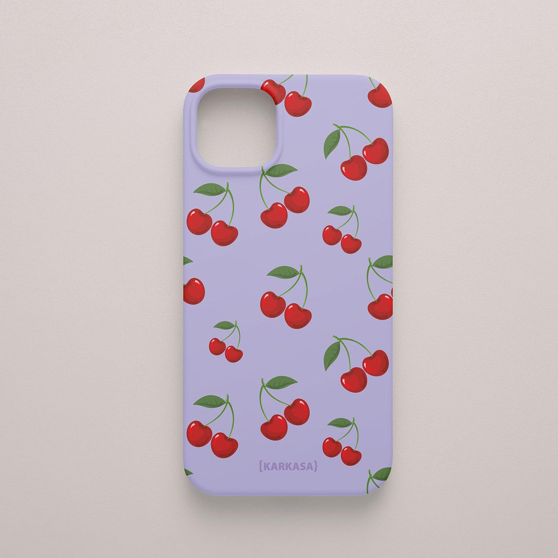 Funda KARKASA Silk Touch lila con estampado pop de cerezas rojas y hojas verdes. Carcasa estilo frutal aesthetic.
