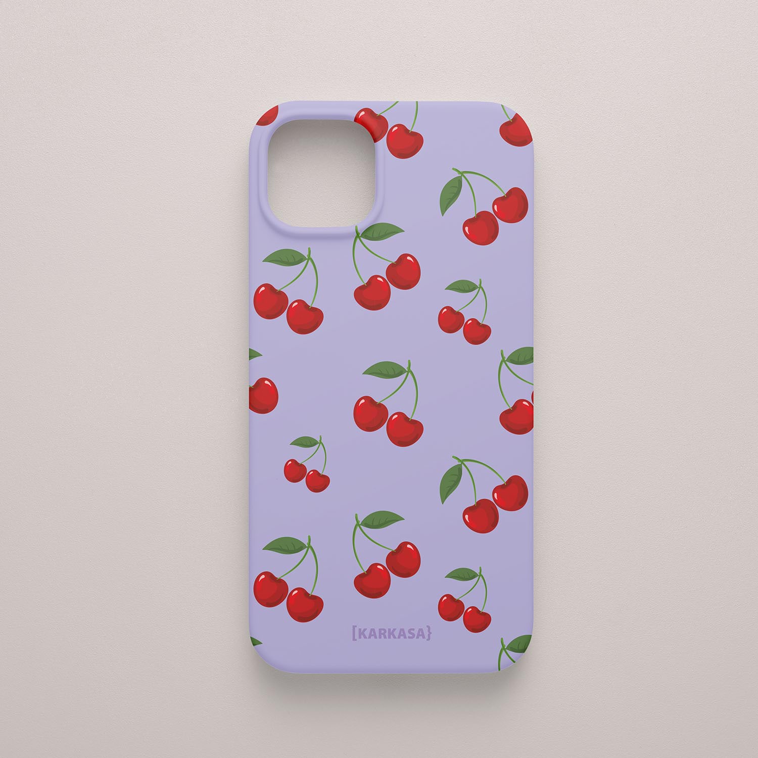 Funda KARKASA Silk Touch lila con estampado pop de cerezas rojas y hojas verdes. Carcasa estilo frutal aesthetic.