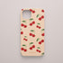 Funda KARKASA Silk Touch rosa nude con estampado pop de cerezas rojas y hojas verdes. Carcasa estilo frutal aesthetic.