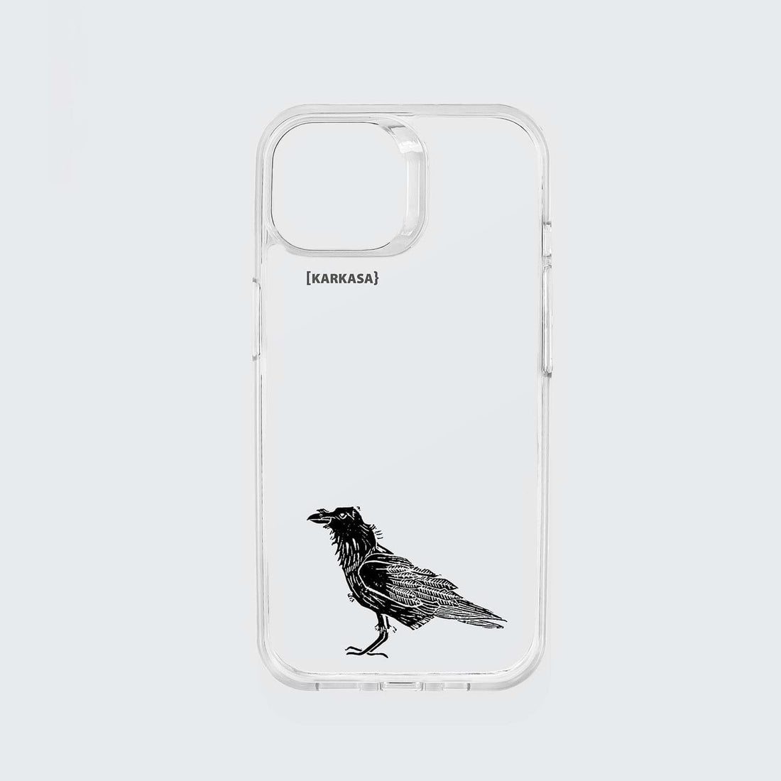 Funda KARKASA transparente antigolpes con ilustración minimalista de un cuervo negro posado, dibujo en tinta del artista Daniel Buitrón.