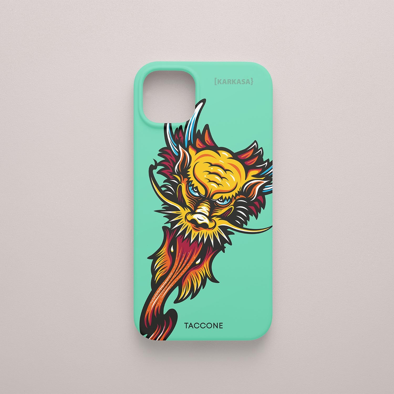 Funda KARKASA verde menta con ilustración colorida de una cabeza de dragón estilo tatuaje neo-tradicional, diseño de Gabriel Taccone.