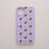Funda KARKASA Silk Touch lila con estampado pop de fresas rojas y lunares blancos. Carcasa mate de silicona estilo frutal.