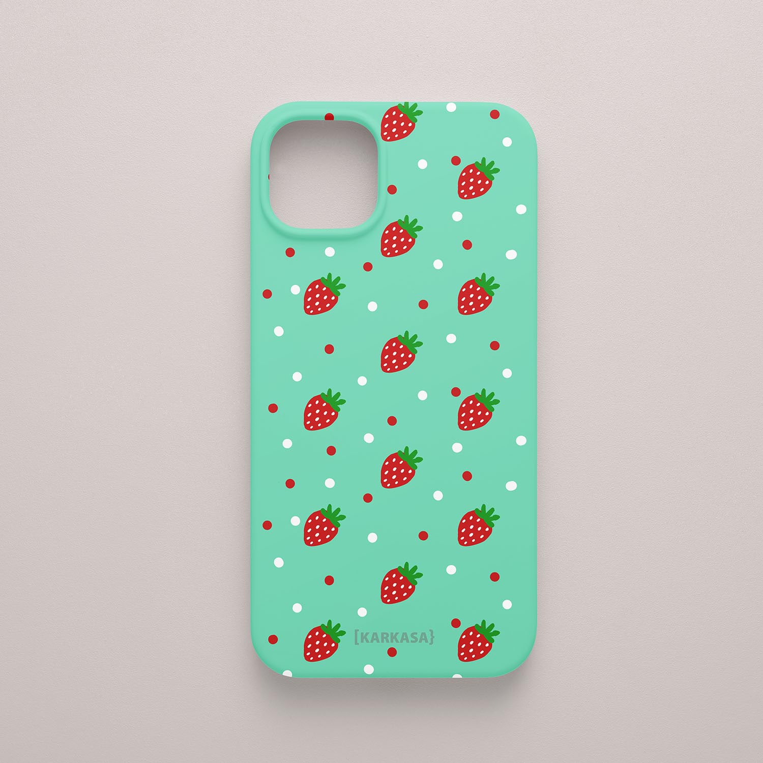 Funda KARKASA Silk Touch verde menta con estampado pop de fresas rojas y lunares blancos. Carcasa mate de silicona estilo frutal.