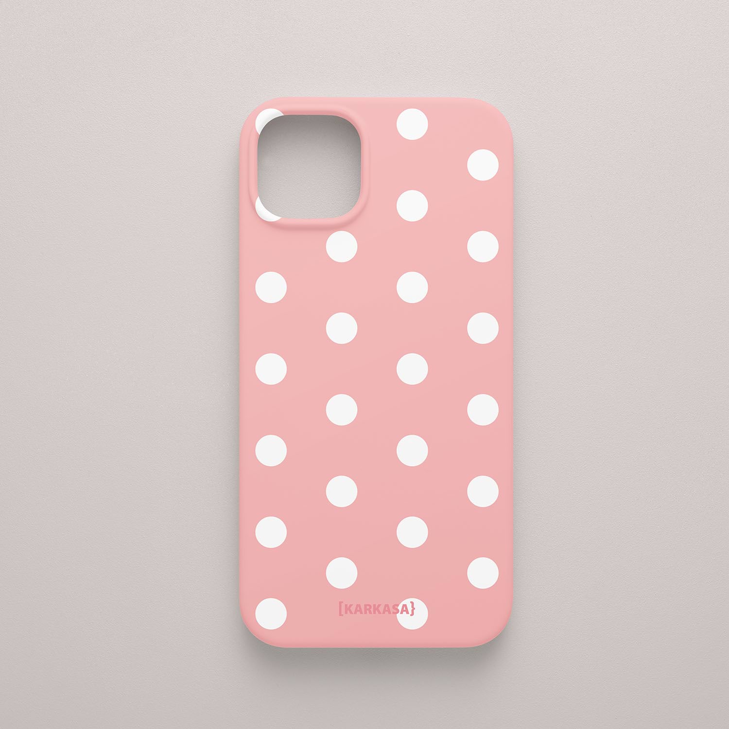 Funda KARKASA Silk Touch rosa chicle con estampado clásico de lunares blancos (polka dots). Carcasa mate de silicona estilo retro vintage.