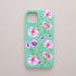 Funda KARKASA Silk Touch verde menta con pintura de orquídeas rosas y tallos verdes estilo acuarela. Carcasa floral artística.