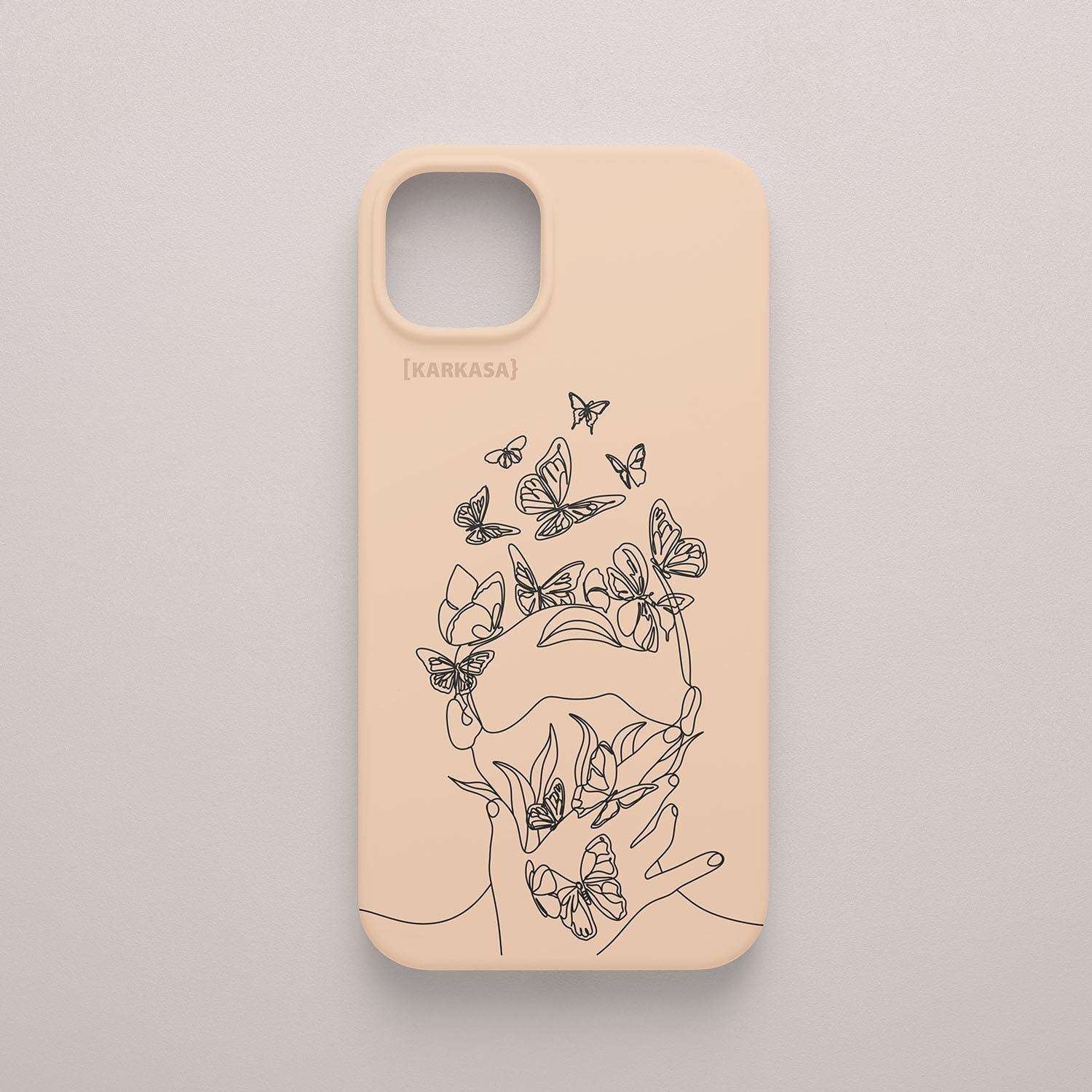 Funda de móvil KARKASA con diseño lineal negro de silueta de mujer y mariposas, en silicona mate Silk Touch rosa nude.