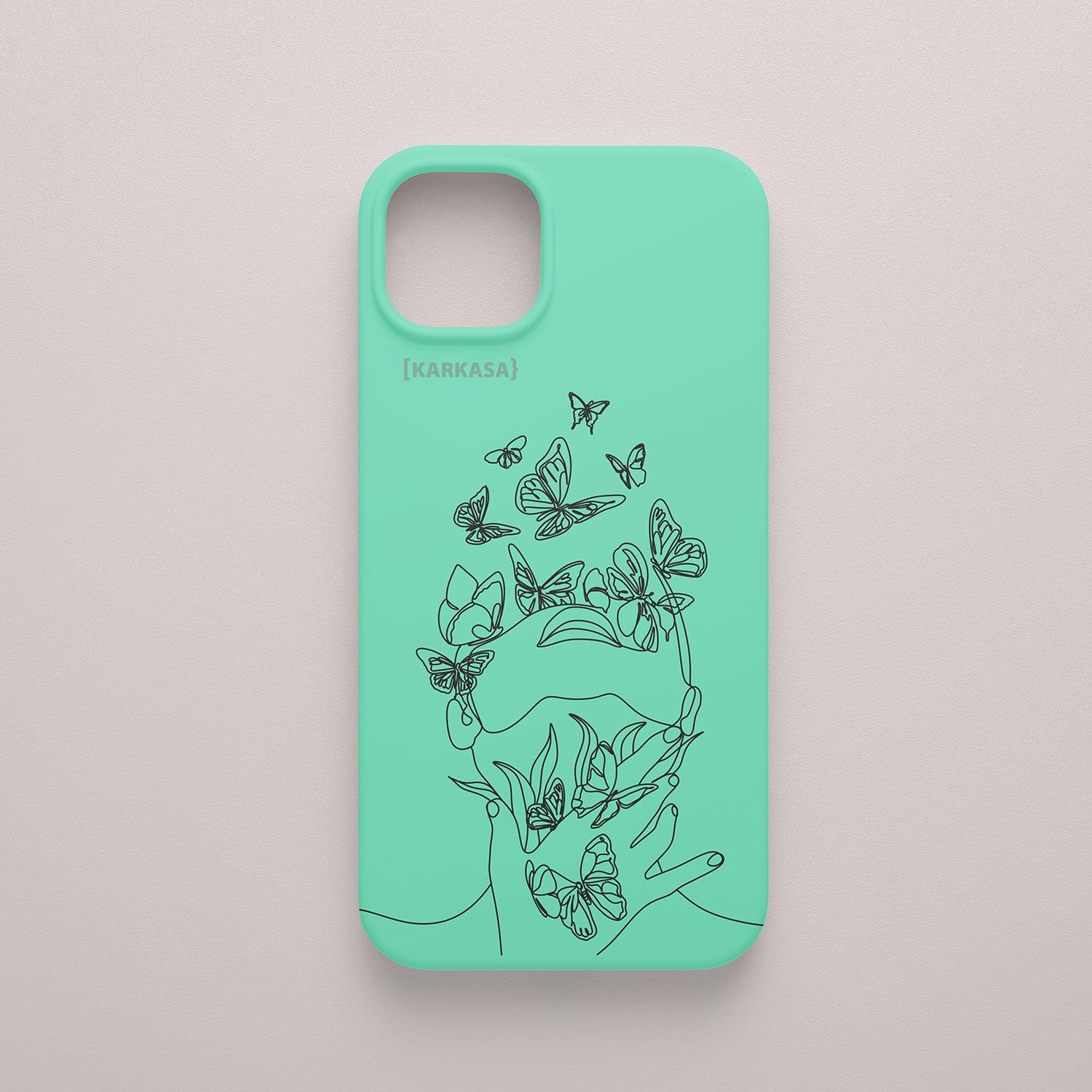 Funda de móvil KARKASA con diseño lineal negro de silueta de mujer y mariposas, en silicona mate Silk Touch verde menta