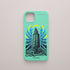Funda KARKASA verde menta con ilustración gráfica de Gabriel Taccone: Torre de Hércules de A Coruña con olas azules y rayos amarillos.